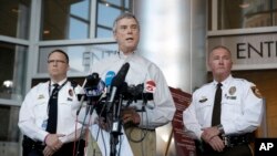 St. Louis County Prosecutor Robert McCulloch, center, speaks during a news conference along side St. Louis County Police Chief Jon Belmar, right, and Webster Groves Police Captain Stephen Spear, left, Sunday, March 15, 2015, in Clayton, Mo. 