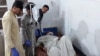 An injured victim of gunmen firing on passenger vehicles is treated at a hospital in Parachinar, in Kurram district of Pakistan's northwestern Khyber Pakhtunkhwa province, Nov. 21, 2024.