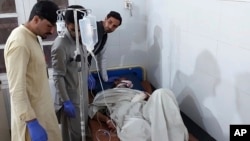 An injured victim of gunmen firing on passenger vehicles is treated at a hospital in Parachinar, in Kurram district of Pakistan's northwestern Khyber Pakhtunkhwa province, Nov. 21, 2024.