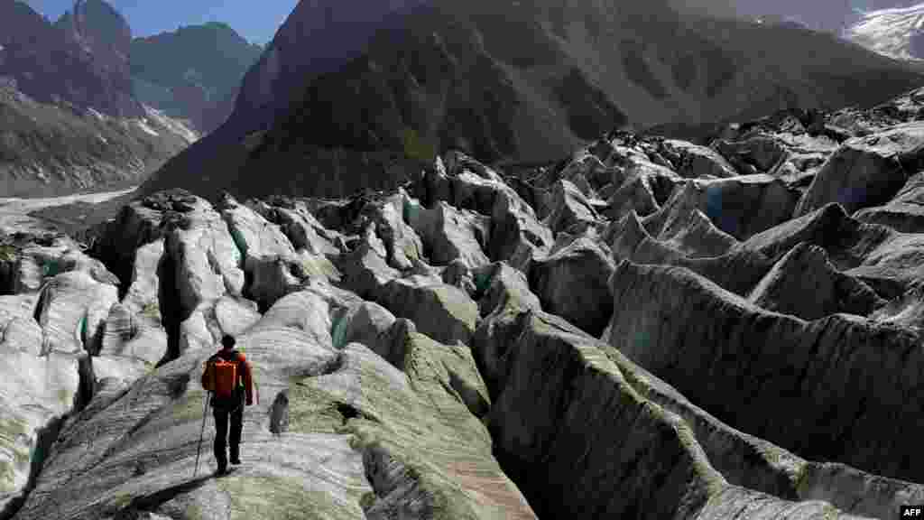 An alpinist ascends the Mer de Glace in Chamonix, France. 