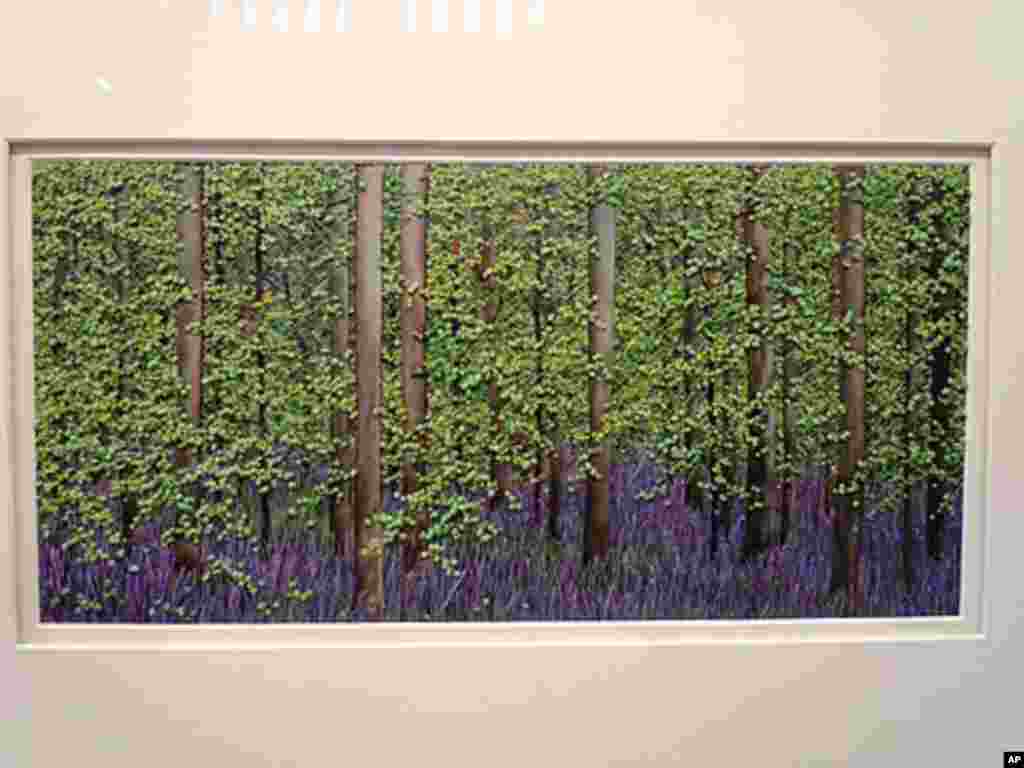 'Spreading Periwinkle' is a landscape in thread by mixed media collage artist Martha Fieber of Manistique, Michigan. The piece is valued at $7,500.