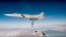 In this photo made from the footage taken from the Russian Defense Ministry official website on Nov. 26, 2017, Russian Tu-22M3 long-range bombers strike Islamic State targets in Syria.