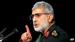 FILE - Gen. Esmail Qaani, head of Iran's Quds Force, speaks during a ceremony in Tehran, Iran, Jan. 1, 2021. Qaani is one of seven people sanctioned by the United Kingdom on Dec. 14, 2023.