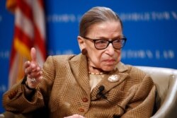 FILE - In this Feb. 10, 2020, file photo U.S. Supreme Court Associate Justice Ruth Bader Ginsburg speaks during a discussion on the 100th anniversary of the ratification of the 19th Amendment at Georgetown University Law Center in Washington. (AP…