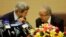 U.S. Secretary of State John Kerry talks with Algeria's Foreign Minister Ramtane Lamamra (R) before addressing a news conference at the Foreign Ministry in Algiers, April 3, 2014. 