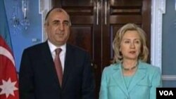 Azerbaijani Foreign Minister Elmar Mammadyarov and U.S. Secretary of State Hillary Clinton before their meeting.