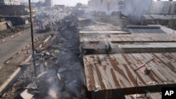 FILE - Burnt buildings are seen at a scene of an explosion at an industrial building in Nairobi, Kenya February 2, 2024.