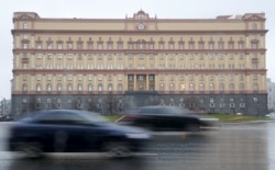FILE - Cars drive past the headquarters of the Federal Security Service (FSB) in central Moscow, Russia, November 10, 2015.