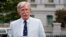National security adviser John Bolton speaks to media at the White House in Washington, July 31, 2019. 