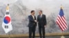 U.S. Secretary of State Antony Blinken, right, and South Korea's National Assembly Speaker Woo Won Shik, left, shake hands during a meeting at the National Assembly in Seoul, Jan. 6, 2025. 