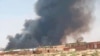 This photo provided by Organization for the General Coordination of Camps for Displaced and Refugees, smoke rises from Abu Zar camp for displaced persons in West Darfur, Sudan, April 6, 2021. 