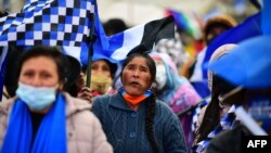 Supporters of Bolivian leftist presidential candidate Luis Arce attend the closing rally of his campaign in El Alto, Bolivia, on Oct. 14, 2020. 