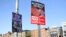 FILE - In this photo taken May 17, 2018, pro and anti-abortion poster's on lampposts, in Dublin. In homes and pubs, on leaflets and lampposts, debate rages in Ireland over whether to lift the country's decades-old ban on abortion.