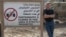 FILE - Mark Frerichs, a contractor from Illinois, poses in Iraq in this undated photo obtained from Twitter that he would include with his resume when job hunting. Frerichs was abducted in Afghanistan in January 2020.