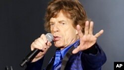 Melanie Hamrick, bailarina estadounidense y pareja de Jagger dirigió la producción con los clásicos temas "Paint it Black", "Sympathy for the Devil" y "She's a Rainbow". En la gráfica, Mick Jagger en Pittsburgh, Pensilvania, 20-6-15. (AP Foto/Keith Srakocic).