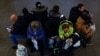 People take shelter inside a metro station during a Russian military strike, amid Russia's attack on Ukraine, in Kyiv, Ukraine Jan. 15, 2025. 