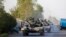FILE - Azerbaijan tanks move toward Agdam, Azerbaijan, following days of escalated fighting between Azerbaijani and Armenian forces over a tense line of control around Nagorno-Karabakh, Aug. 2, 2014.