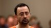 Mantan dokter yang melatih tim senam nasional AS, Larry Nassar, hadir dalam sidang pengadilan Ingham County Circuit di Lansing, Michigan, pada 22 November 2017. (Foto: AFP/Jeff Kowalsky)