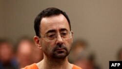 Mantan dokter yang melatih tim senam nasional AS, Larry Nassar, hadir dalam sidang pengadilan Ingham County Circuit di Lansing, Michigan, pada 22 November 2017. (Foto: AFP/Jeff Kowalsky)