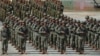 Chinese military personnel line up during the Golden Dragon military exercise in Svay Chok village, Kampong Chhnang province, north of Phnom Penh, Cambodia, May 30, 2024. 