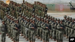 Golden Dragon military exercise in Svay Chok village, Kampong Chhnang province, north of Phnom Penh, Cambodia, May 30, 2024. China will boost its defense spending by 7.2% this year.