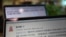 An online post by the Quanzhou police detailing the investigation and an apology for an incident where police personnel let themselves Into the hotel room of Zhou Chen, an environmental reporter for Caixin, seen on computer screens in Beijing, China, Nov.