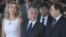 Brazil's President Michel Temer, center, and wife Marcela Temer, watch an Independence Day military parade in Brasilia, Brazil, Sept. 7, 2016. Pictured right is Lower House Speaker Rodrigo Maia. 