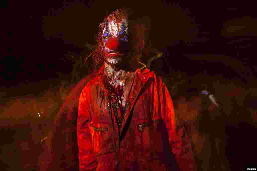 A participant marches in the annual Halloween parade in New York, Oct. 31, 2013. 