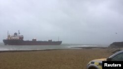 A Russian ship is seen grounded in Falmouth, Cornwall, Britain December 18, 2018 in this photo obtained from social media. (Sean Stratton/via Reuters)