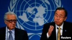 U.N. Secretary-General Ban Ki-moon sits beside U.N.-Arab League envoy for Syria Lakhdar Brahimi (L) as he addresses a news conference after the Geneva-2 peace talks in Montreux on January 22, 2014.