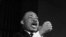 Martin Luther King, Jr. shakes his fist during a speech in Selma, Alabama, Feb. 12, 1965.