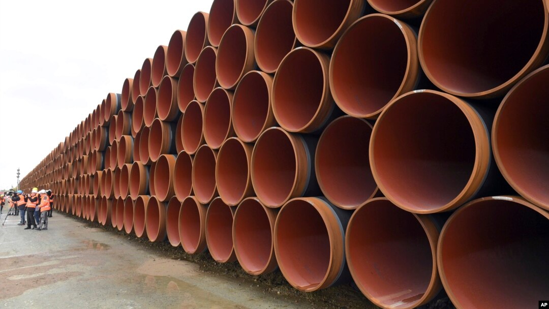 FILE - Steel pipes for the North Stream 2 pipeline are stacked in Mukran harbor in Sassnitz, Germany, May 8, 2017. 