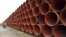 FILE - Steel pipes for the North Stream 2 pipeline are stacked in Mukran harbor in Sassnitz, Germany, May 8, 2017. 