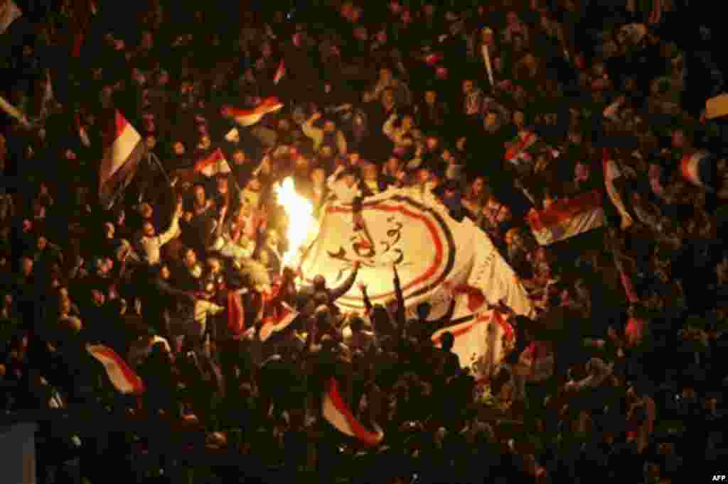 Egyptians celebrate after President Hosni Mubarak resigned and handed power to the military at Tahrir Square, in Cairo, Egypt, Friday, Feb. 11, 2011. Egypt exploded with joy, tears, and relief after pro-democracy protesters brought down President Hosni Mu