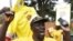 A supporter of Uganda's President Yoweri Museveni celebrate as the electoral commission declared Yoweri Museveni the winner of the presidential election in capital Kampala, Feb. 20, 2016. 