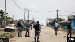 Gabonese gendarmes patrol in Cocotiers neighborhood near the headquarters of the national broadcaster Radiodiffusion Television Gabonaise (RTG) in Libreville on Jan. 7, 2019 after a group of soldiers sought to take power in Gabon while the country's ailing president was abroad.