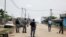 Gabonese gendarmes patrol in Cocotiers neighborhood near the headquarters of the national broadcaster Radiodiffusion Television Gabonaise (RTG) in Libreville on Jan. 7, 2019 after a group of soldiers sought to take power in Gabon while the country's ailing president was abroad.