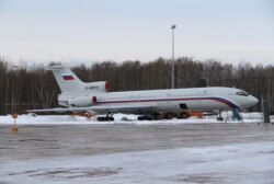 FILE - A Tupolev Tu-154 stands on the tarmac of the Chkalovsky military airport north of Moscow, Russia, Jan. 15, 2015. A plane similar to this one was used by Russia in the April 2017 Washington fly-over.
