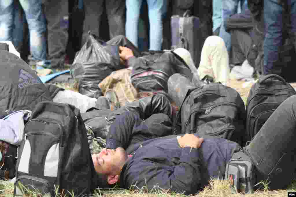 Refugees say they were exhausted when they arrived in Croatia and want to move forward through Hungary into western Europe as soon as possible, Opatovac, Croatia, Sept. 22, 2015. (Heather Murdock/VOA) &nbsp; 