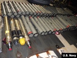 FILE - The crew of the USS Normandy seized this illicit shipment of weapons and weapon components intended for the Houthis in Yemen, aboard a stateless dhow in the Arabian Sea, Feb. 9, 2020. (U.S. Navy photo)
