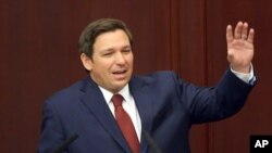 FILE- In this March 5, 2019 file photo, Florida Gov. Ron Desantis gives his state of the state address on the first day of the legislative session in Tallahassee, Fla. De Santis has pushed for a repeal to Florida's ban on smokable medical marijuana…