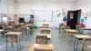 FILE - An empty classroom is seen in a private school in Hawally, after the Ministry of Education suspended schools and universities due to the coronavirus outbreak, in Kuwait City, Kuwait, March 2, 2020.