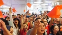 Des manifestants pro-Pékin et anti-gouvernementaux s'opposent à Hong-Kong