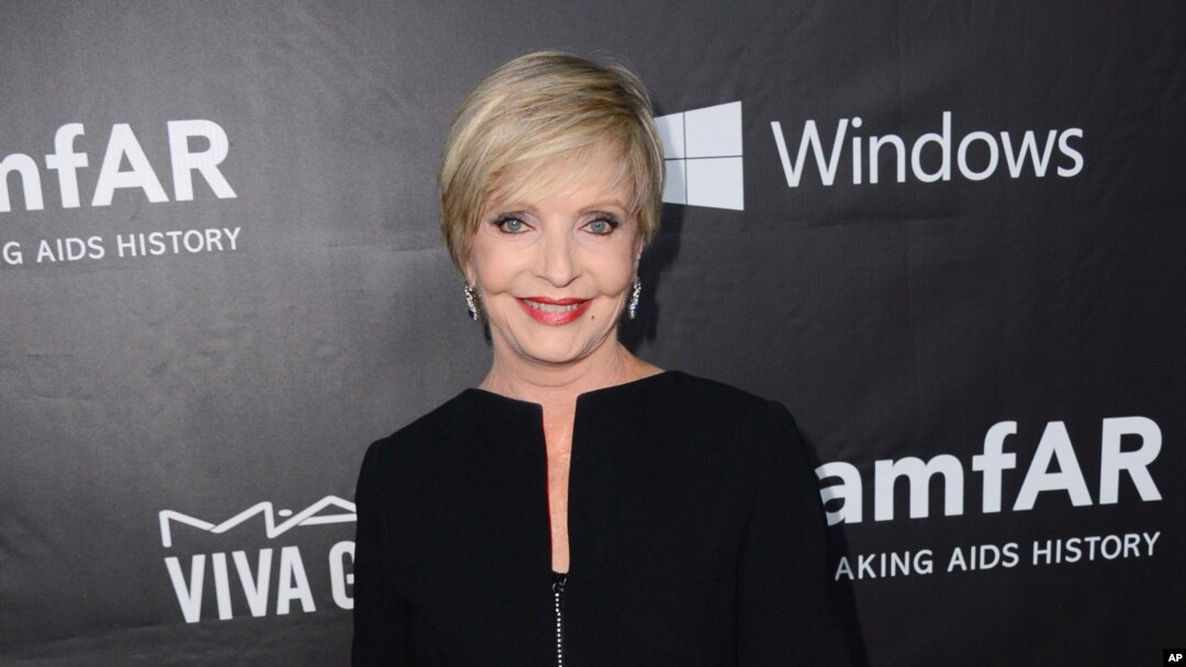 FILE - Florence Henderson arrives at the 2014 amfAR Inspiration Gala at Milk Studios in Los Angeles.