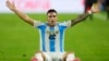 Argentina's Lautaro Martínez celebrates scoring his side's first goal against Colombia during the Copa America final soccer match in Miami Gardens, Fla., July 14, 2024. 