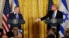 FILE - U.S. President Donald Trump, right, reaches out to Israeli Prime Minister Benjamin Netanyahu during a joint news conference at the White House in Washington, Feb. 15, 2017. 