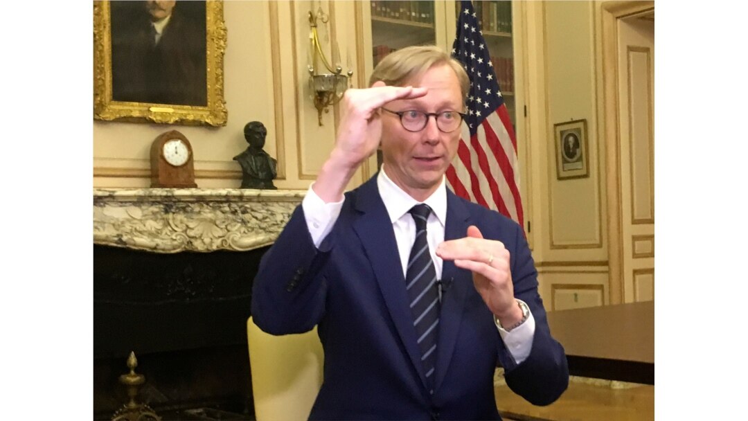 FILE - Brian Hook , the U.S. special envoy for Iran, gestures during an interview in Paris, June 27, 2019. (AP)