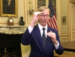 FILE - Brian Hook , the U.S. special envoy for Iran, gestures during an interview in Paris, June 27, 2019. (AP)