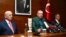 Turkey's President Recep Tayyip Erdogan, center, speaks to the media at Ataturk Airport before his departure for London for a two-day official visit, in Istanbul, May 13, 2018.