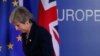 British Prime Minister Theresa May leaves after addressing a media conference at an EU summit in Brussels, March 22, 2019. 